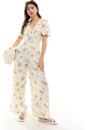 ASOS Spun flutter sleeve wide leg jumpsuit in floral print