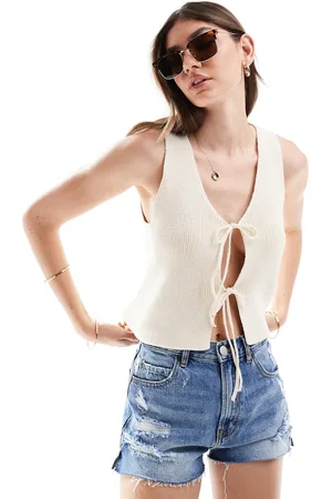 ASOS Knitted waistcoat with tie front in cream