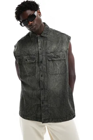 ASOS 90s oversized sleeveless denim shirt in washed