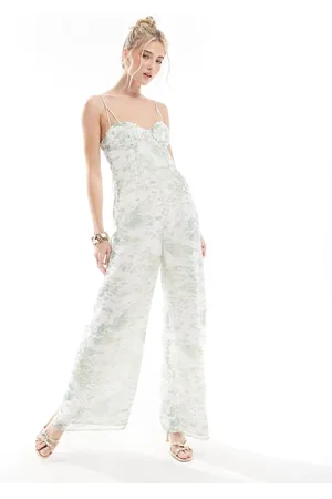 ASOS Raw edge corset panelled jumpsuit with cut out in blurred animal print