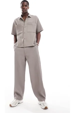 Bershka Wide leg plisse trouser co-ord in light brown