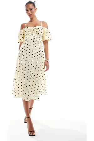 River Island Polka dot puff sleeve midi dress in
