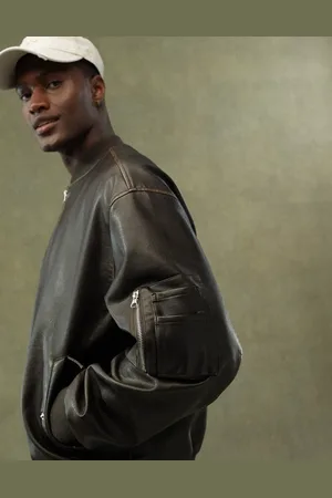ASOS Faux leather oversized distressed bomber jacket in