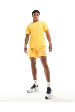 PUMA Run Favourite Velocity 5"" shorts in sun stream