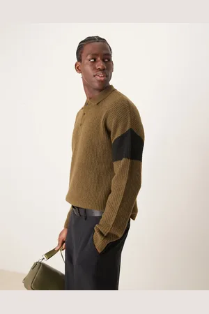 ASOS Relaxed boxy fit ribbed knitted polo jumper in with black sleeve panel