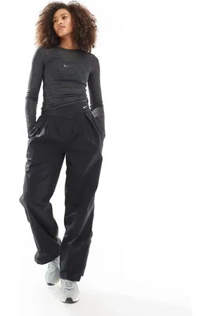 Nike Swoosh asymetric trousers in