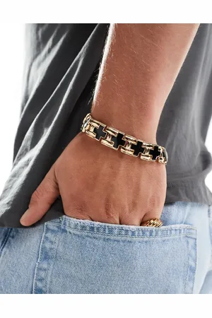 ASOS Chunky bracelet with cross design in tone