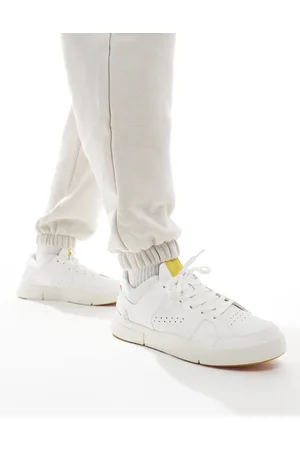 On Running ON The Roger Clubhouse trainers in and yellow