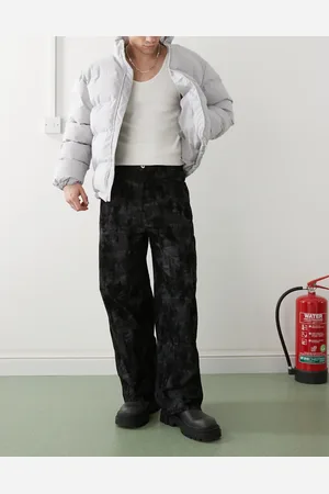 COLLUSION Baggy jeans with flocked camo print in