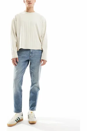 ASOS Stretch tapered jeans in mid wash