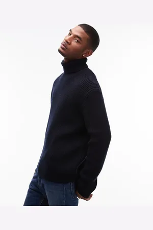 ARKET Wool blend knitted rib oversized rollneck sweater in