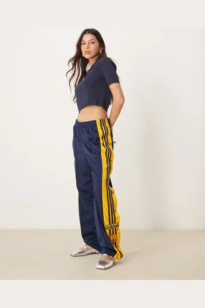 adidas Adibreak track pants in and yellow
