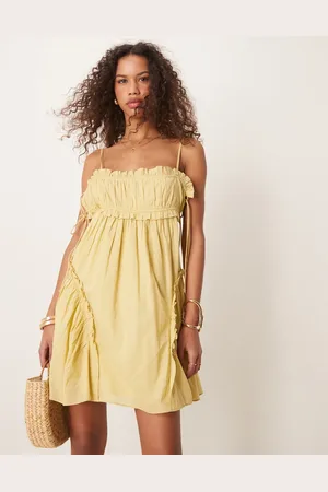 ASOS Babydoll mini dress with ruffle hem in washed lime