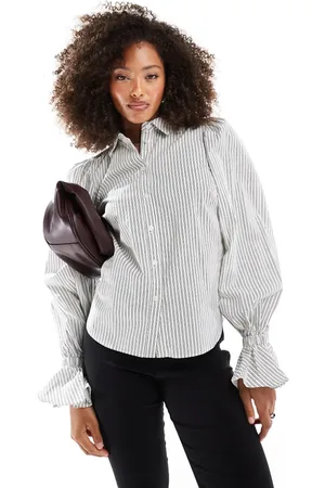 ASOS Cotton volume sleeve ruffle cuff shirt in black and white stripe