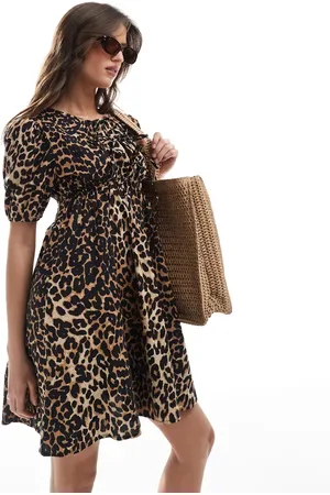 Esmée Esmee Exclusive tie front puff sleeve mini beach dress in leopard print