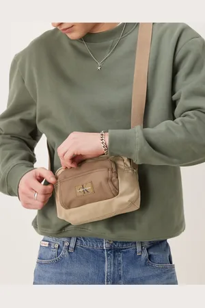 Calvin Klein Workwear camera bag in beige