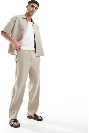 Bershka Wide leg tailored trouser in sand