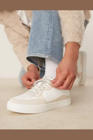 Calvin Klein Classic cupsole trainers in beige and white