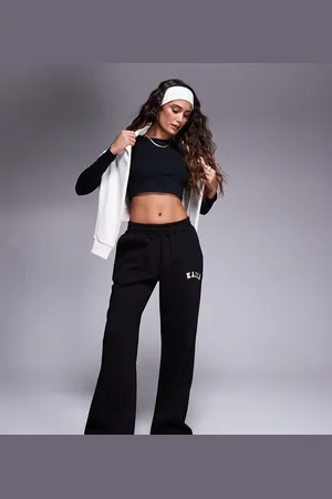 Kaiia Petite embroidered logo wide leg joggers in