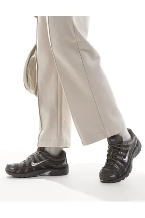 Nike P-6000 trainers in and metallic silver