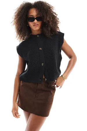 ASOS Boxy knitted stitch waistcoat with button detail in