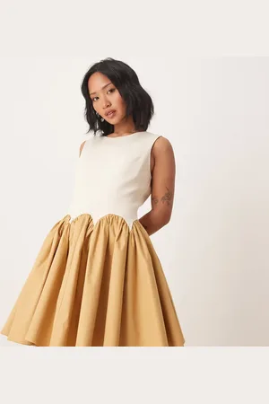 Never Fully Dressed Petite contrast drop hem mini dress in camel