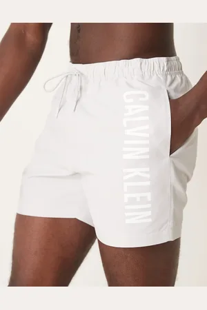 Calvin Klein Intense Power logo swim shorts in light