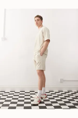 Umbro Panelled mesh shorts in beige