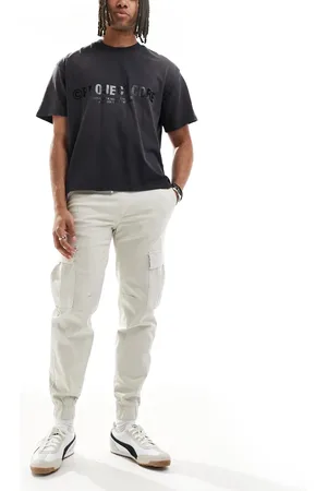 Bershka Cuffed cargo trouser in beige