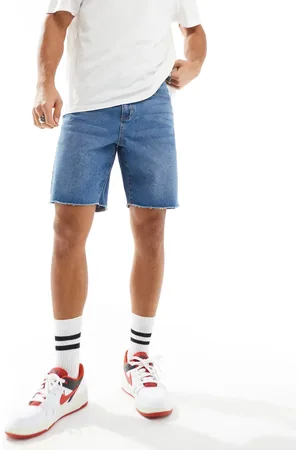 ADPT. Wide fit cut off denim shorts in mid wash