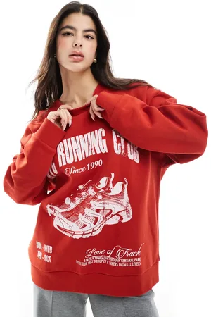 ASOS Oversized sweatshirt with running club graphic in