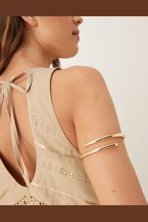 ASOS Arm cuff with wraparound design in gold tone