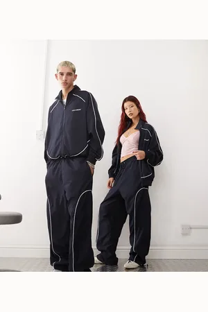 COLLUSION Unisex relaxed jogger with graphic and contrast seams in navy