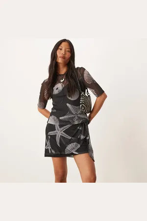 Never Fully Dressed Petite seashell print mesh mini skirt co-ord in