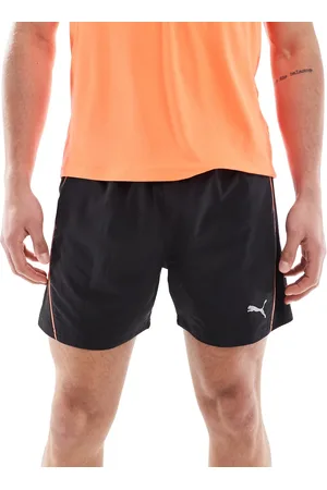 PUMA Run Velocity shorts in with red piping