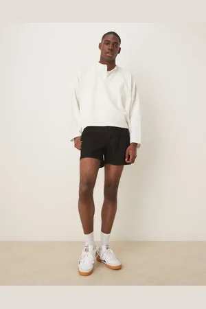 ASOS Short length slim denim shorts with pleats in