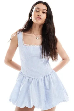 The Frolic Exclusive square neck lace trim puff ball mini dress in stripe