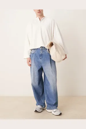 ASOS Oversized baggy jeans with pocket pleats in mid wash