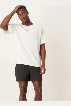 ASOS Shorter length striped shorts in black