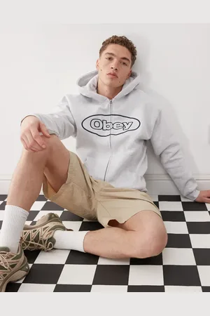 Obey Oval logo zip up hoodie in light