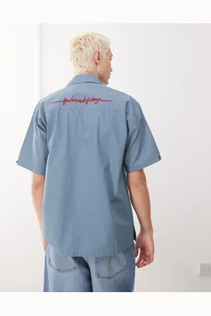 Reclaimed Boxy short sleeve shirt with back embroidery detail in