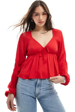 Pimkie Tie front long sleeve peplum top in