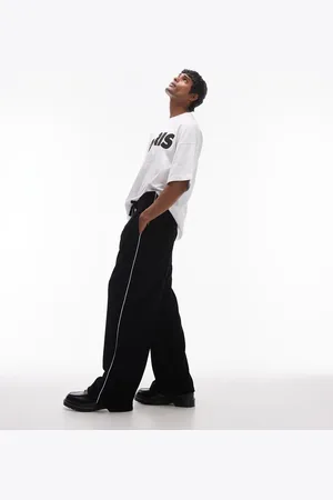 Topman Baggy leg velour joggers with side piping in