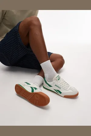 Reebok Campio trainers in off and green