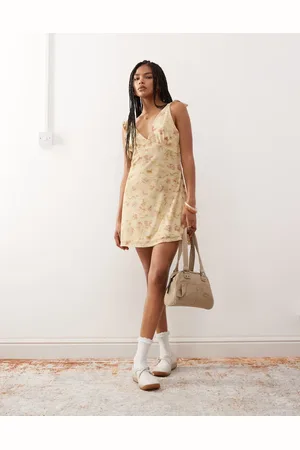 Reclaimed Bow shoulder mini dress in floral print