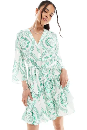 VERO MODA Belted fluted sleeve dress in green floral tile print