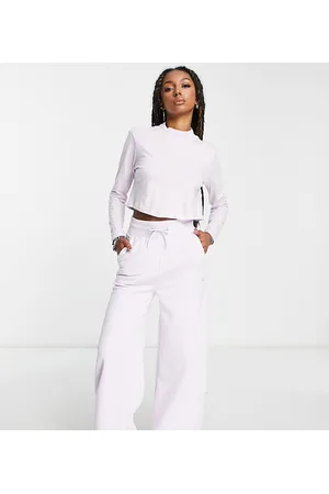 The North Face Wide leg fleece joggers in lilac Exclusive at ASOS