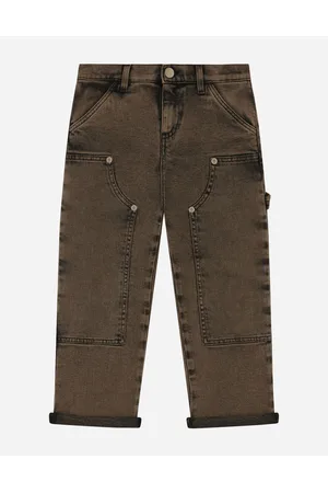 Dolce & Gabbana Hosen und Shorts - Hose aus behandeltem Denim mit Logoplakette