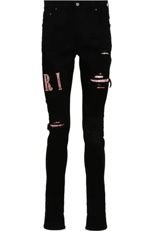 AMIRI Skinny-Jeans mit Logo-Applikation