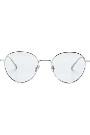 Totême Runde Sonnenbrille mit Logo-Gravur